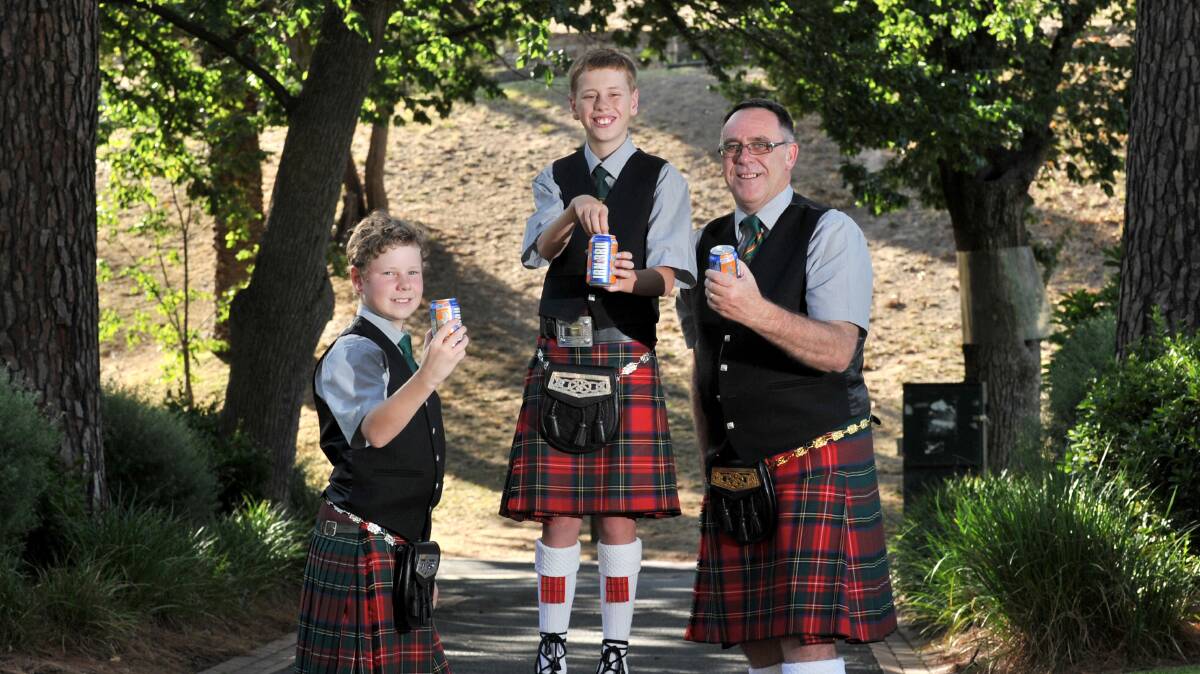 READY: Chris Earl with drummers Will Tamblyn and Spencer Evans, who are all drinking Scottish soft drink IRN-BRU.

Picture: JODIE DONNELLAN 