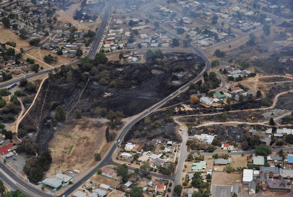 FEBRUARY 8, 2009: This aerial photograph shows the scale of the fire one day after Black Saturday. Picture: Laura Makepeace