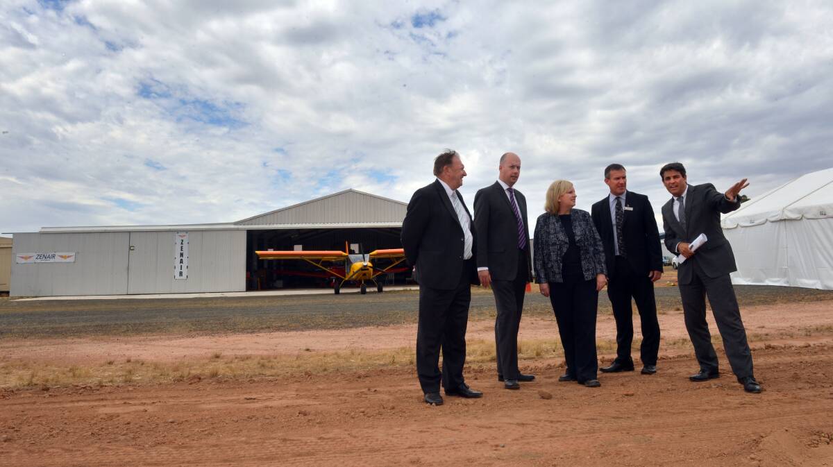 ACTION: Barry Lyons, Gordon Rich-Phillips, Wendy Lovell, Craig Niemann and Stan Liacos announce stage one of the Bendigo Airport redevelopment on Tuesday.  Picture: BRENDAN McCARTHY