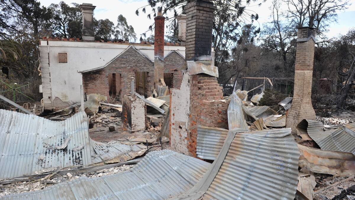 FEBRUARY 8, 2009: One of the homes destroyed by the fire in Happy Valley Road. Picture: Laura Makepeace