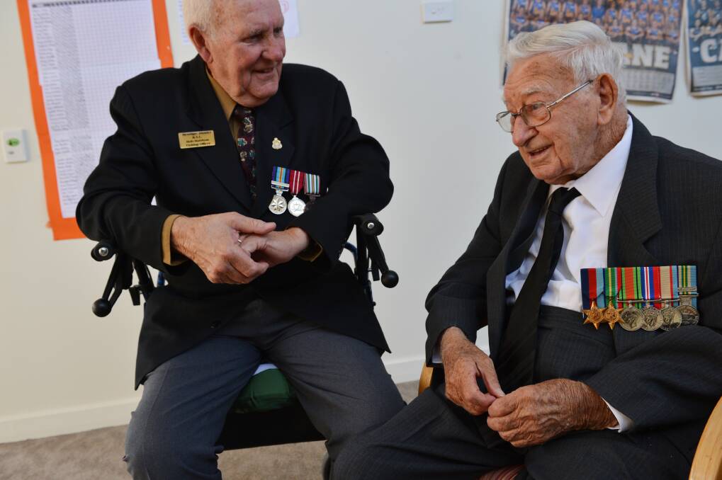 RSL visiting officer Bob Harrison chats with WW2 veteran John Taylor (ex army PFC, 38th Btn & 2nd/1st Pioneers. Explosives expert served Australia & Borneo). Picture: BRENDAN McCARTHY
