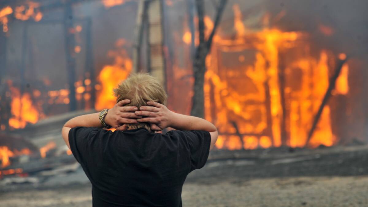 FEBRUARY 7, 2009: The fire at Happy Valley Road claims another house. Picture: Peter Hyett