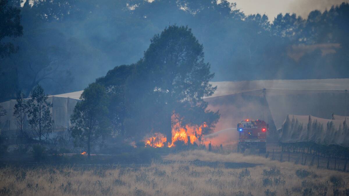 Crews fight a fire in Harcourt. Picture: BRENDAN McCARTHY