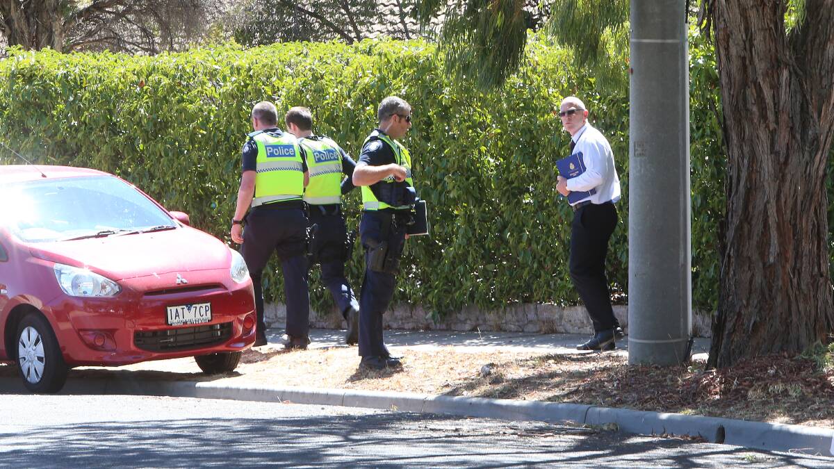 HOLD UP: Police arrest a male after an armed robbery at Max Bakery this morning. Picture: PETER WEAVING