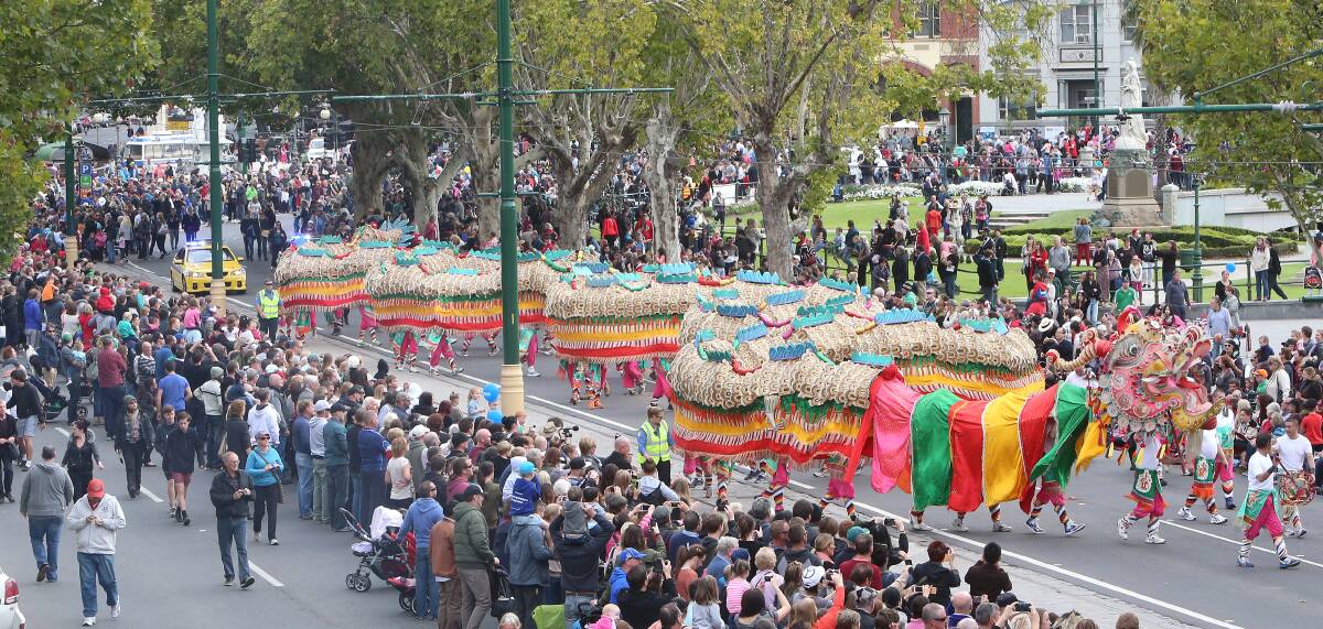 BUMPER AFFAIR: Hundreds poured into the Bendigo CBD for the annual gala parade on Easter Sunday. Picture: PETER WEAVING
