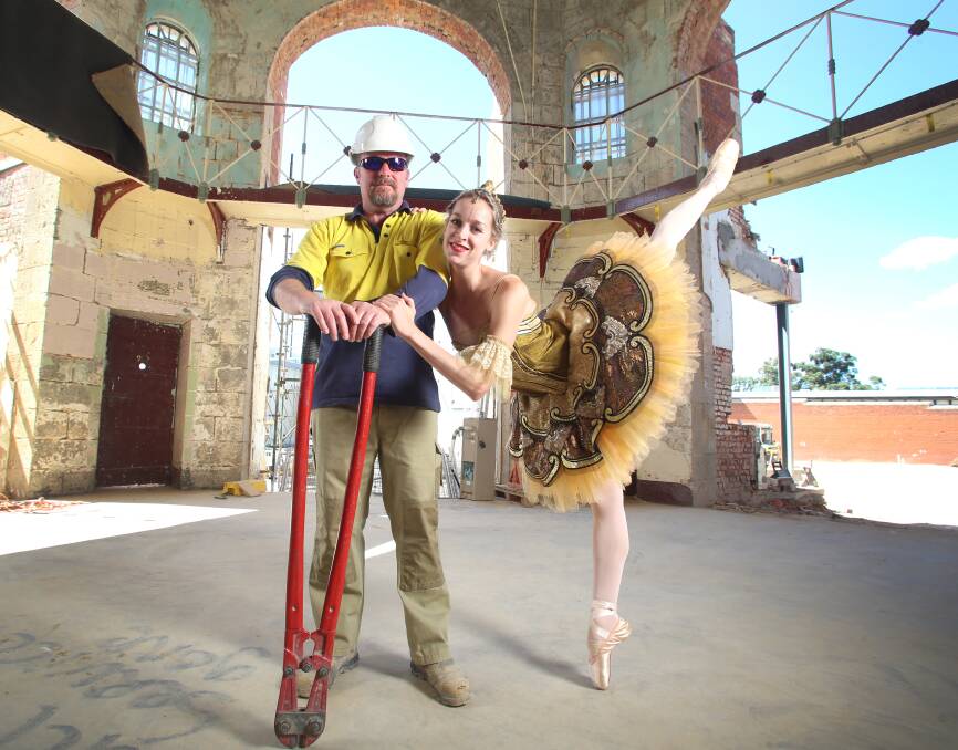 CONTRAST: Ballet dancer Alice Topp, with construction worker Kent Williams. Picture: GLENN DANIELS