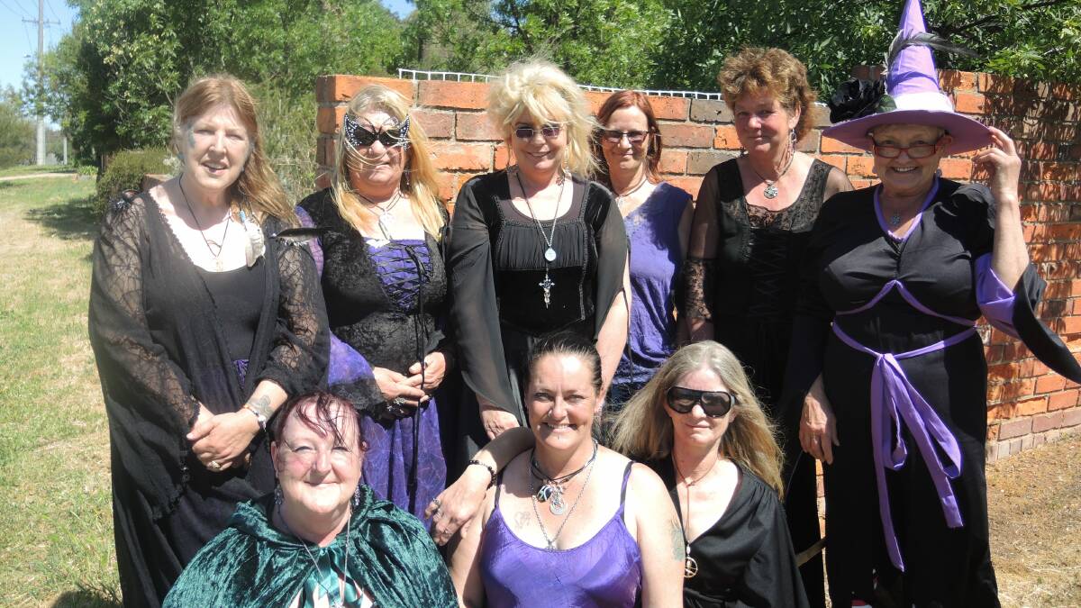 BELIEVERS: White witches Jacquie, Jude, Gaye, Irene, Peta, Barbara, Roslyn, Jodie and Lil at the Wedderburn New Age festival. Picture: EMMA SCHENK 