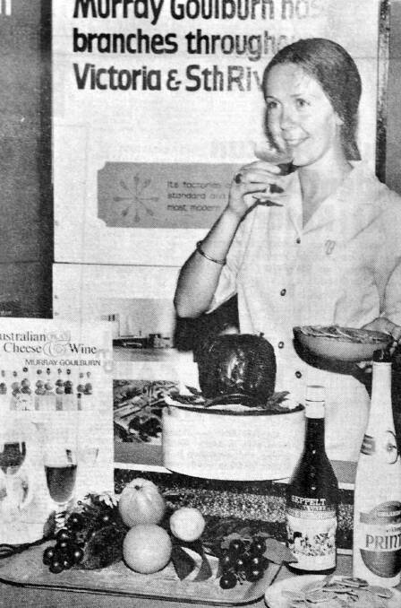 1971 showgirl, Sharon Egan offers samples of wines at the Rochester Dairy Festival event.