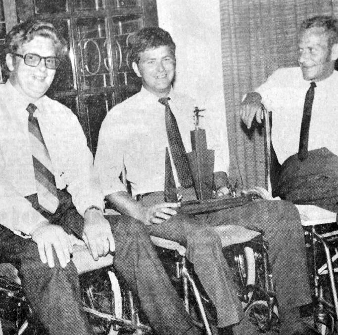 Winner of the inaugural Sportsmen’s Association of Australia sporting award for paraplegics was John Lisle, pictured with Bob Thornton and Leon Addison.
