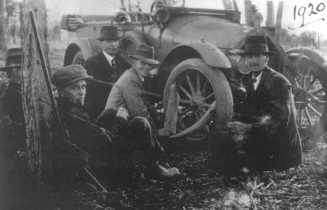 Repairing a tyre out Inglewood way 1920