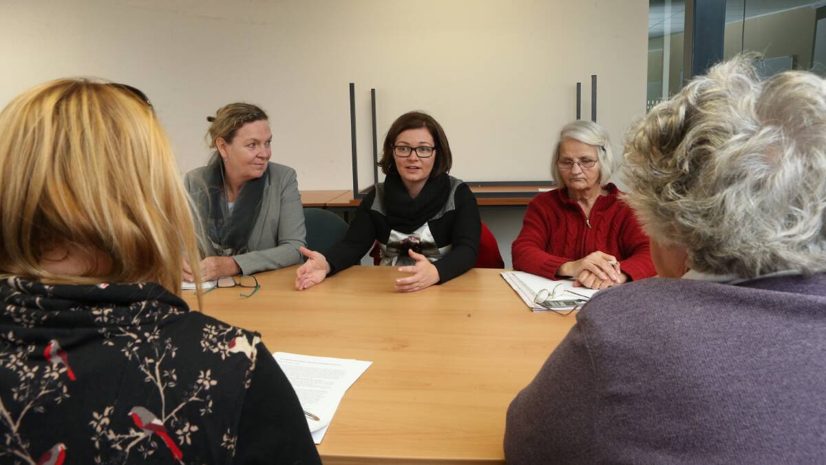 DISCUSSION: Lisa Chesters and Senator Jan McLucas meet with parents of people with disabilities. Picture: PETER WEAVING
