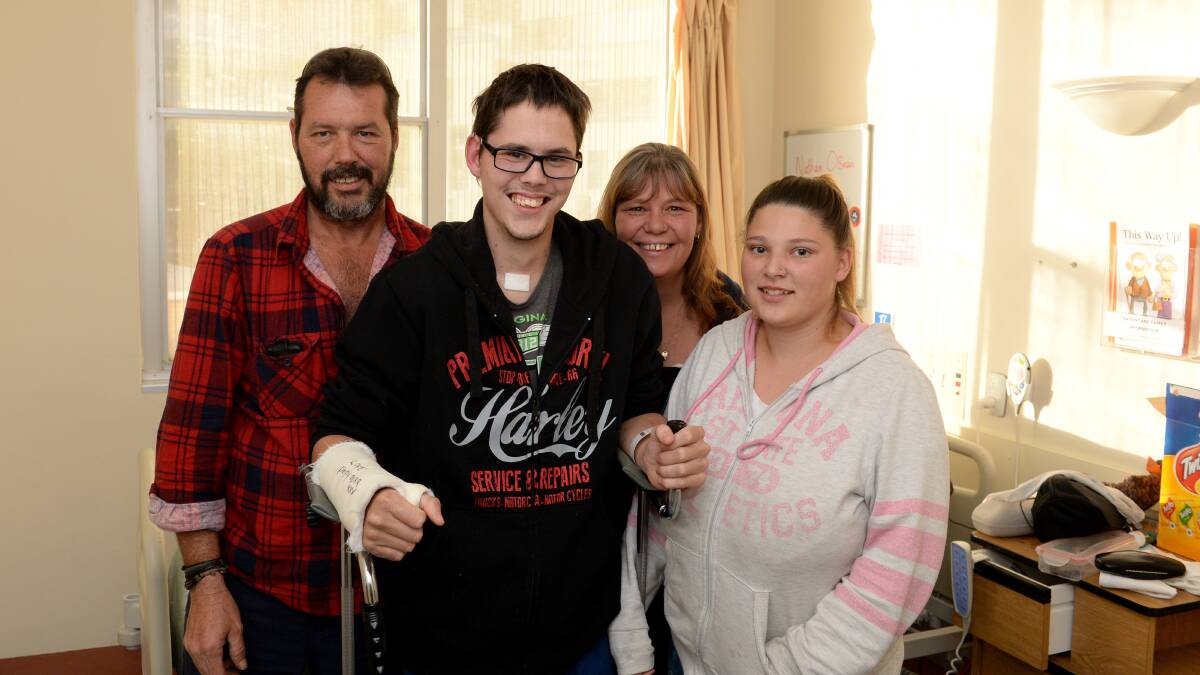 FIGHTER: Mick, Nathan and Trudy O'Brien with Lurlene Baldwin at the Anne Caudle centre this week. Picture: JIM ALDERSEY
