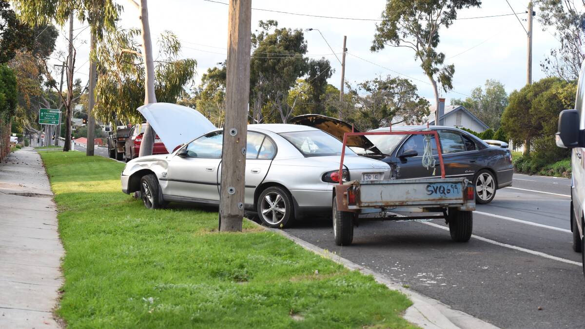 Fire crews and police at the scene of an accident on Eaglehawk Rd on Saturday. Picture: LIZ FLEMING