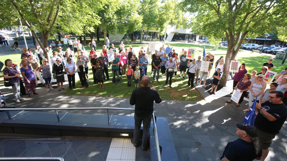 A protest about the HACC at a recent City of Greater Bendigo council meeting. Pictures: PETER WEAVING