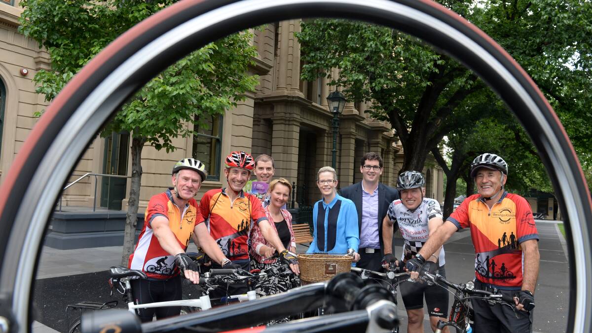 EXCITED: Friends of the Bendigo-Kilmore Rail Trail (BKRT) Rob Nelson and Garry long with Bradd Worrell(ok), Katherine Olszewski, Alicia O'Brien and Steve Abbott from the CoGB with BKRT Phillip Brown and Lindsay Clay. Picture: JIM ALDERSEY
