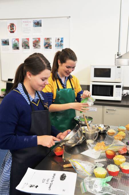 SHOWTIME: Bendigo South East students test their baking skills ahead of next week's Bendigo Show.