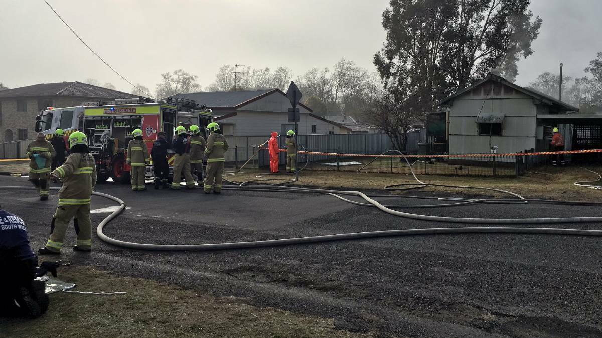 Fire crews attend the scene of a house fire in Cessnock.