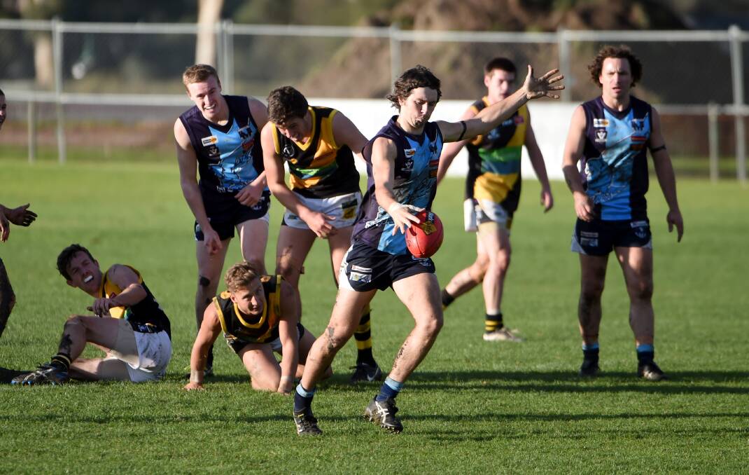 WHAT A GAME: Action from Eaglehawk’s seven-point win over Kyneton on June 14 in the match of the month.