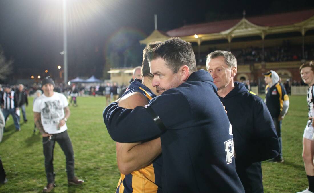EMOTIONAL NIGHT: Aussie Jones embraces captain Steven Stroobants after the Gold's final game last year.