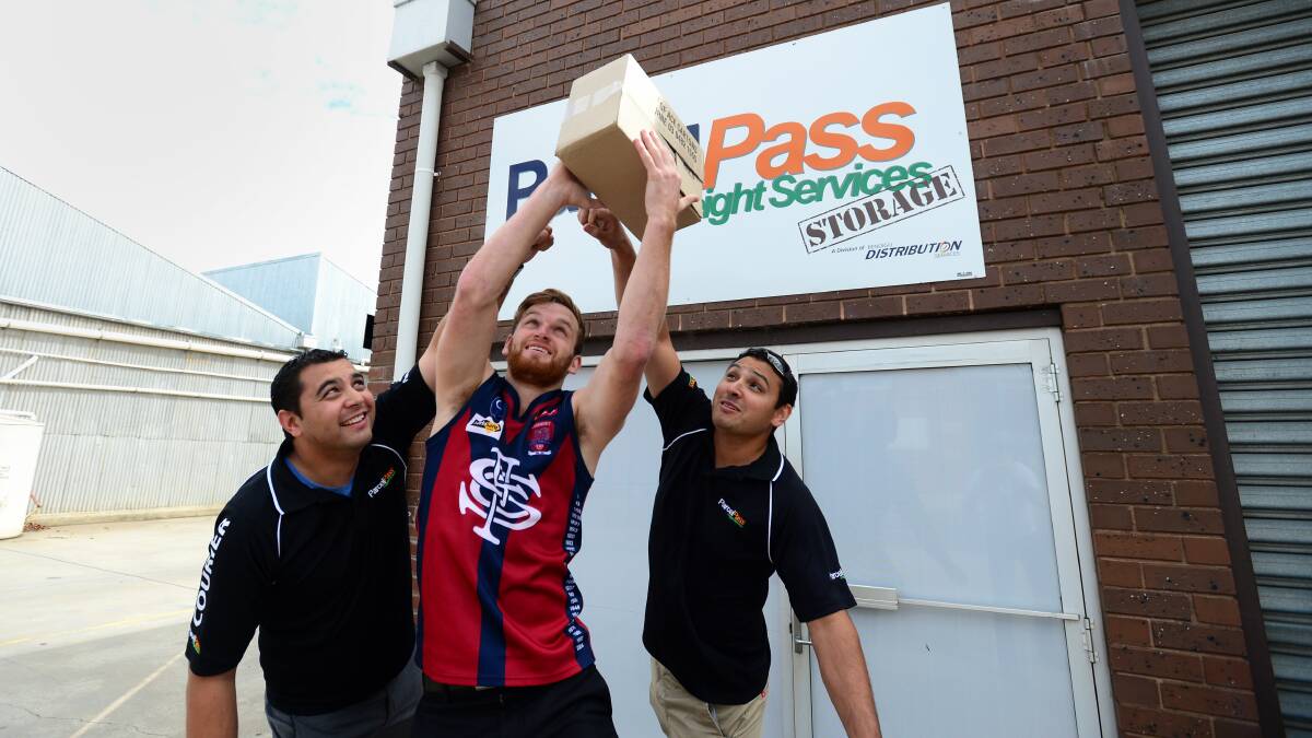AWARD SPONSORS: Parcel Pass' Jerome and Moses Tauelangi with Sandhurst midfielder Nick Stagg.