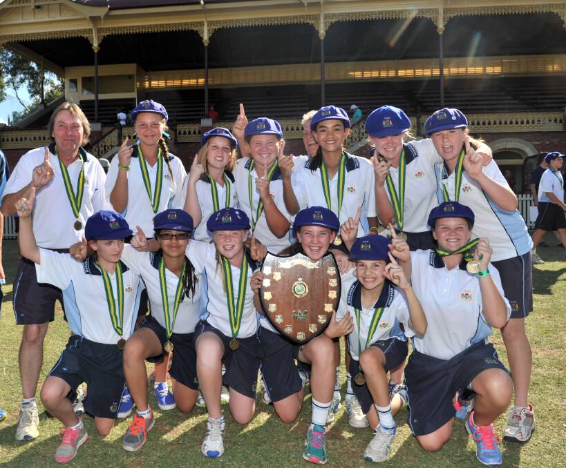 WINNERS: The victorious NSW girls team celebrates.