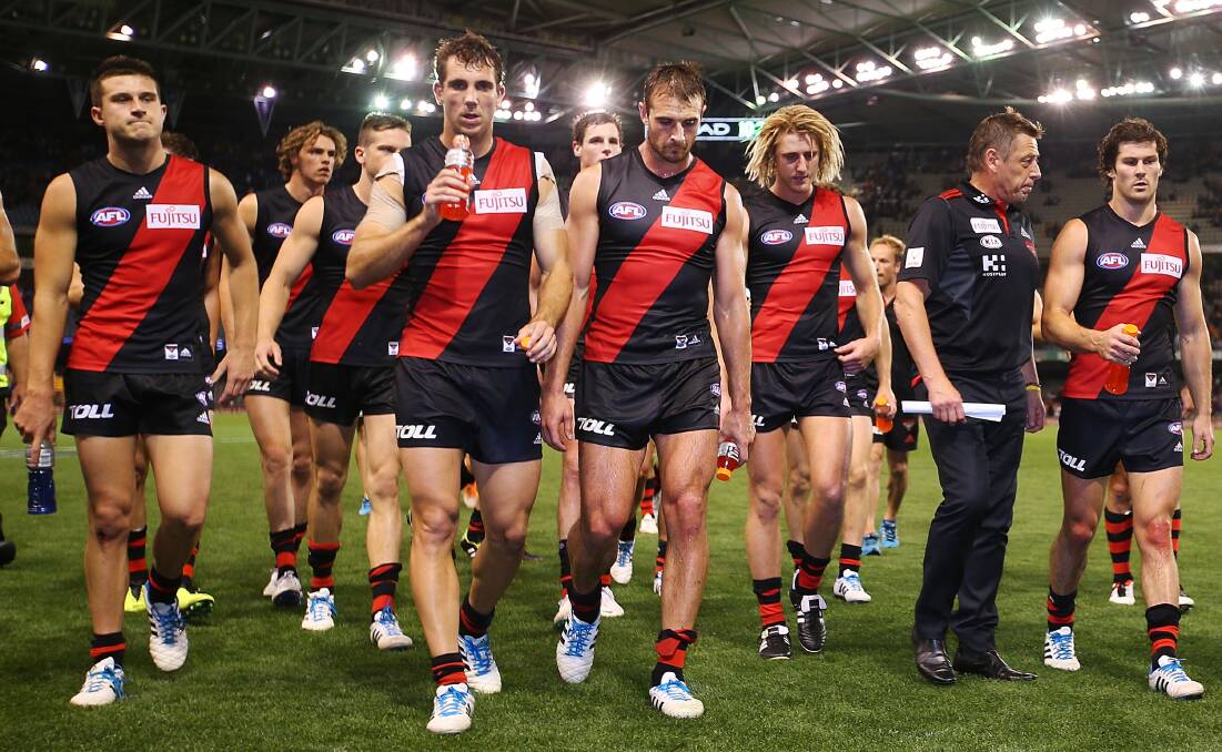 The Bombers leave the field after Friday night's defeat against Hawthorn. Picture: GETTY IMAGES