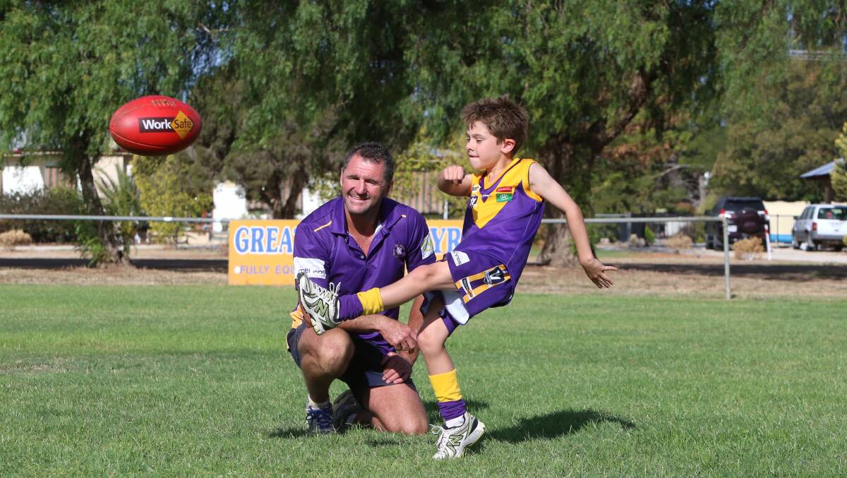 A BEAR OF THE FUTURE: Bears Lagoon-Serpentine senior coach Damien Featherby with young player Jaxon Addlem. Picture: PETER WEAVING