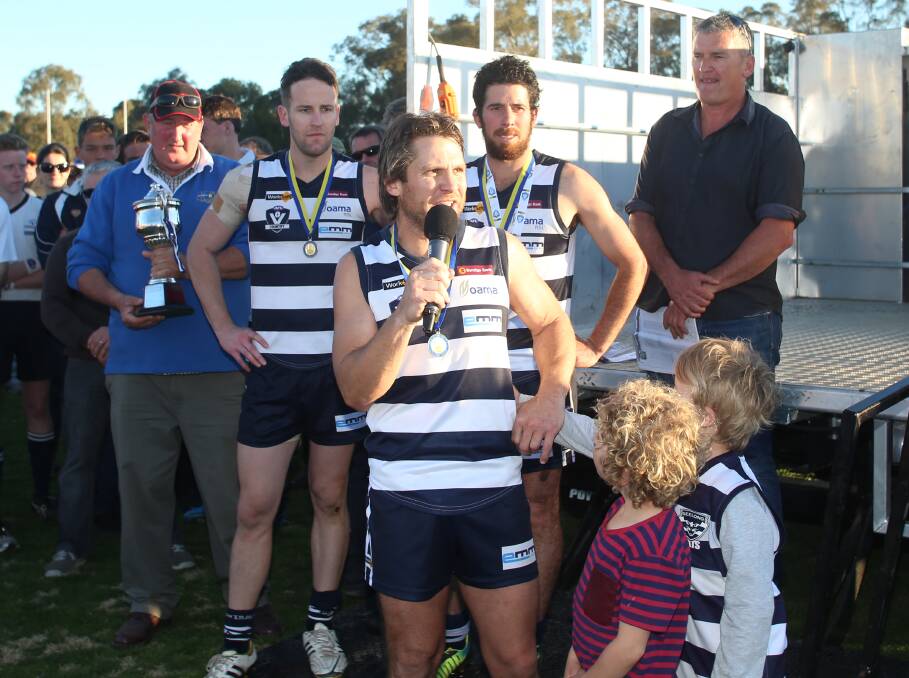 JOB WELL DONE: Adrian Dohnt after coaching the Cats to last month's HDFL premiership.