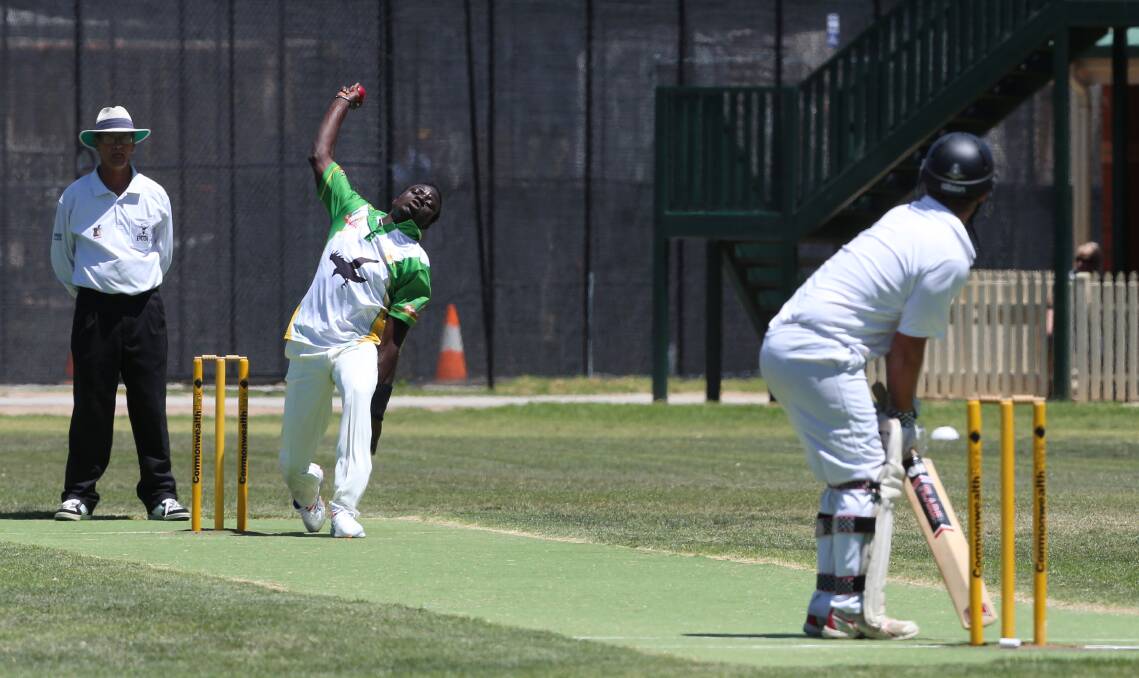 PACE: Spring Gully's Saheed Akolade bowls against United on Saturday. Pictures: PETER WEAVING