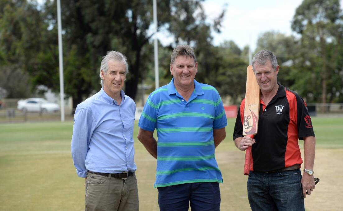 DEMON DELIGHT: Premiership president Rod Flavell, captain-coach Max Taylor and player Jock Schofield.