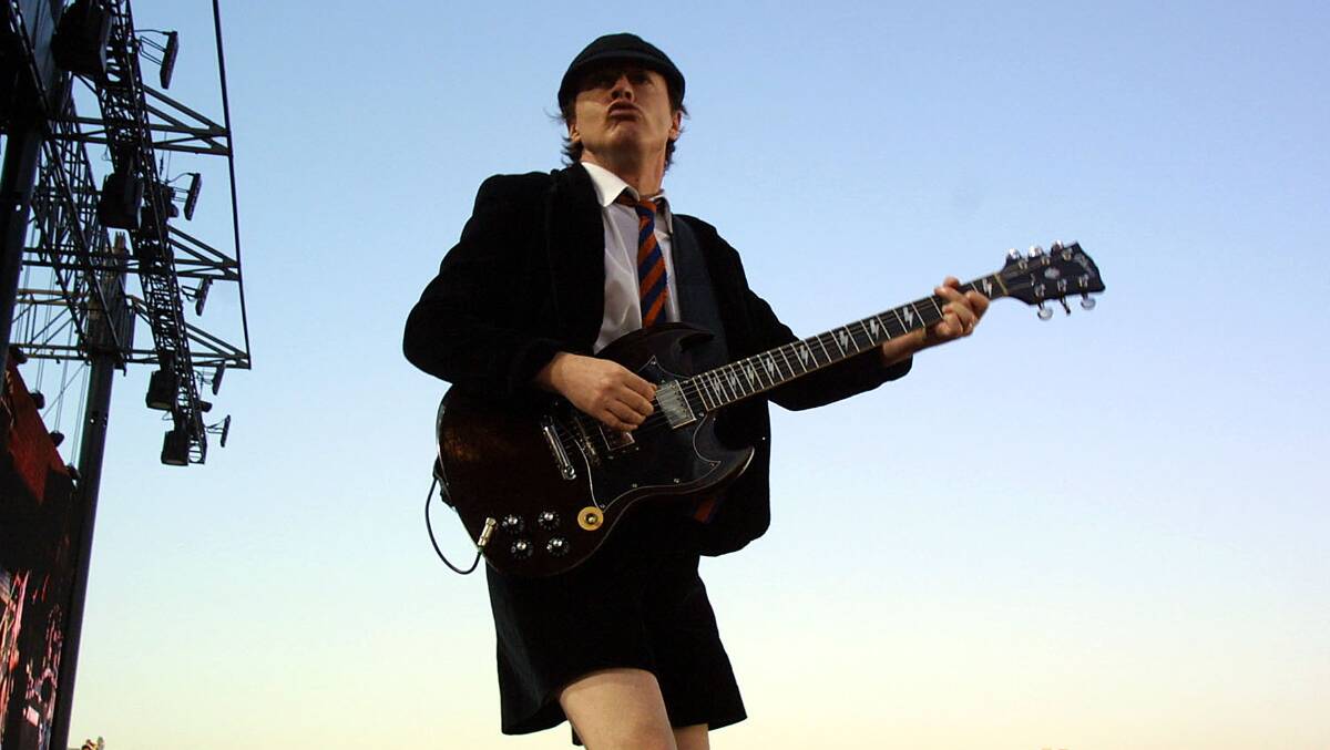 LEGEND: Westy will use any excuse to print a photo of AC/DC guitarist Angus Young. Picture: GETTY IMAGES