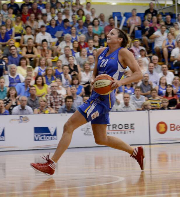 READY FOR TAKE-OFF: Kelsey Griffin in last year's WNBL grand final. Picture: JULIE HOUGH
