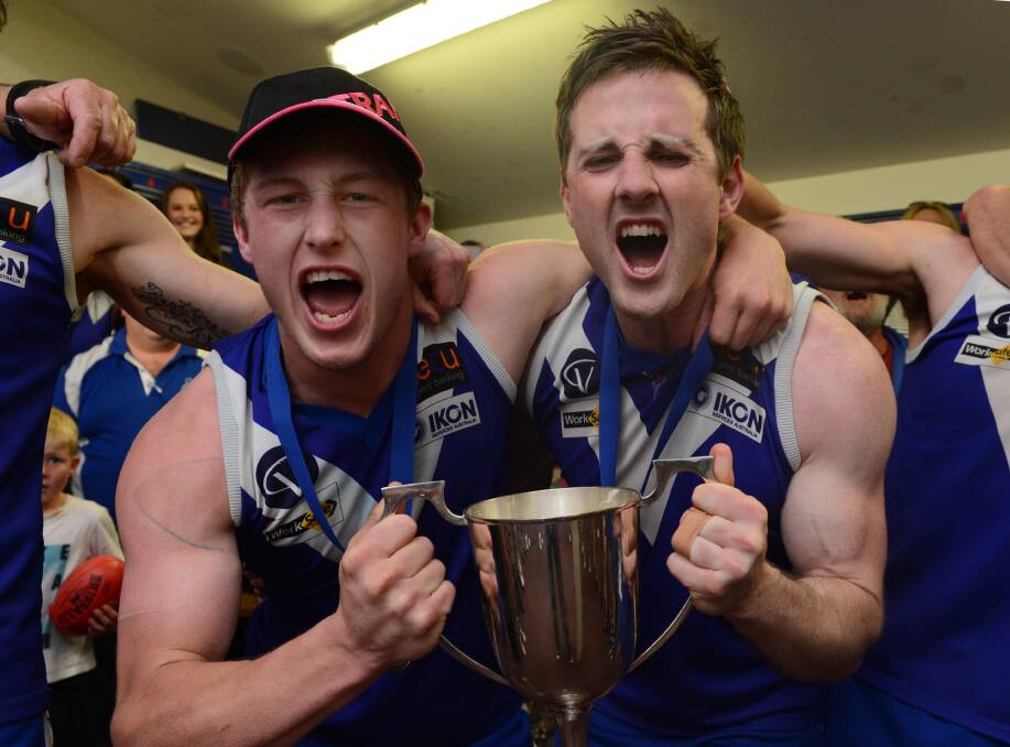 Sunbury's Greg Hay and Nial McGovern after the Lions' 2012 grand final win. Picture: Adam Trafford.