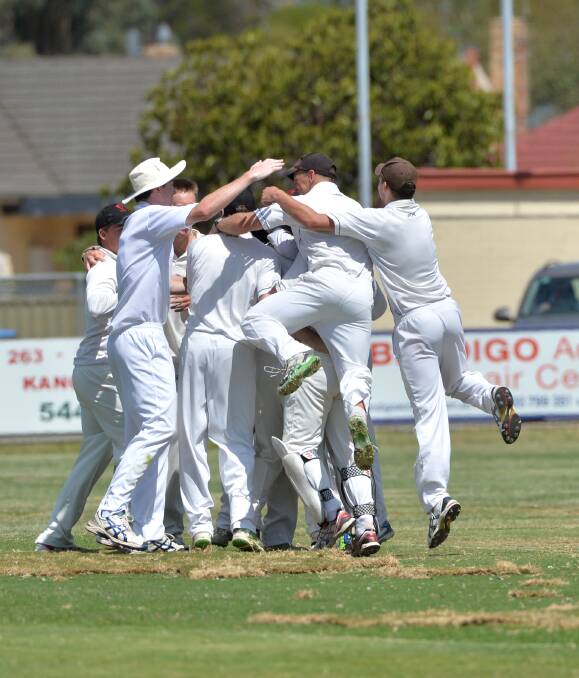 WHAT A WIN: White Hills celebrates its seven-run victory over Kangaroo Flat. Unfortunately for the Demons, they needed to win outright to push into the finals. Picture: GLENN DANIELS