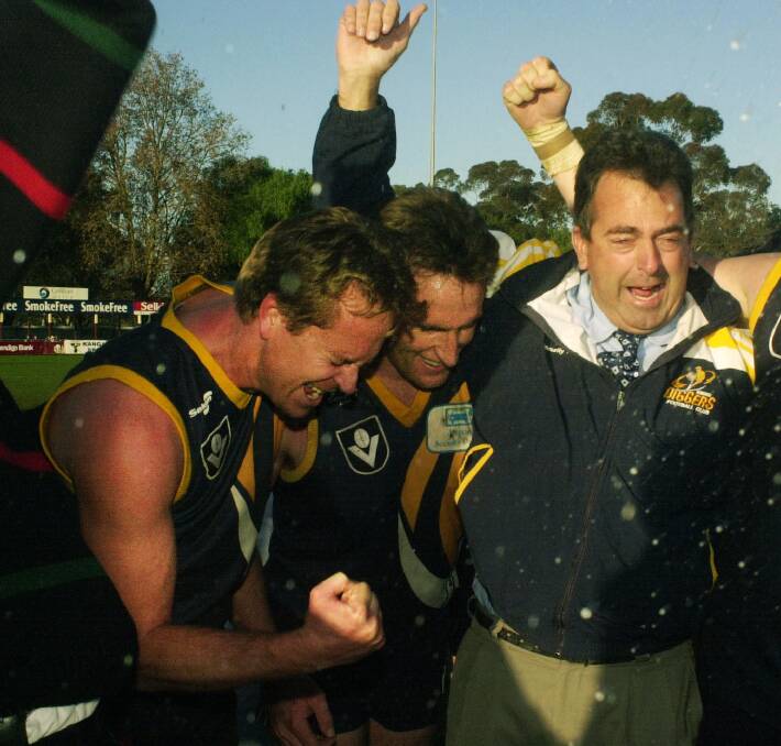 Bendigo Diggers coach Nathan Bower, Clint Whitsed and general manager Ken Yates after the 2000 win over the Murray Kangaroos.