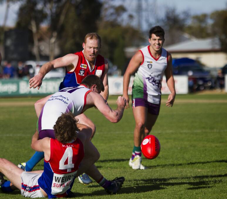 GOTCHA: St Arnaud captain Ben Batters lays a tackle on Birchip-Watchem's Connor Walsh on Saturday. Picture: JASON SMITH