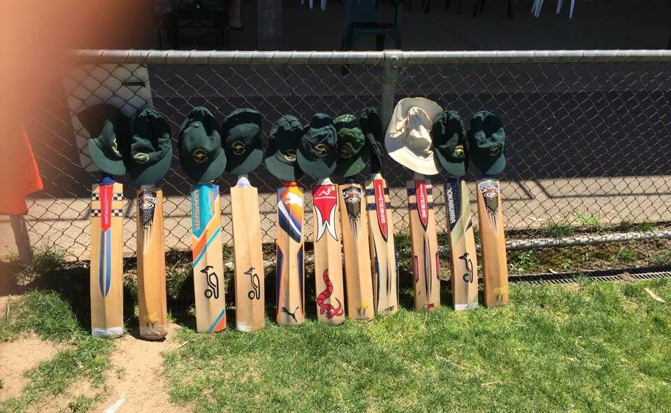 Kangaroo Flat players put their bats out in honour of Phillip Hughes.