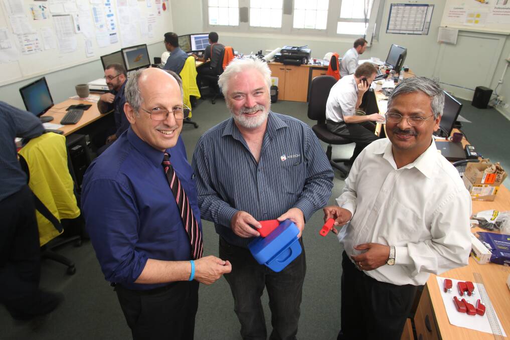 WINNERS: Keech Australia CEO Dr Herbert Hermens, left, with director Garth Keech and innovation manager Dr Bala Hebbar in the Keech Innovation Centre. Picture: FILE