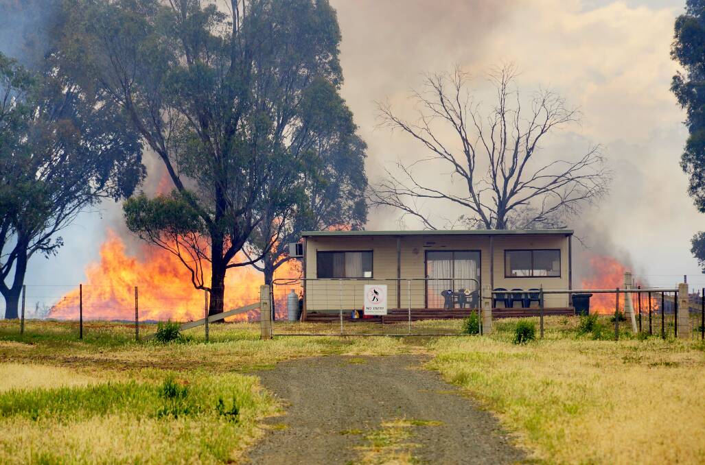 THURSDAY: This picture taken by Luke Wallis shows flames at the back of the vineyard office.