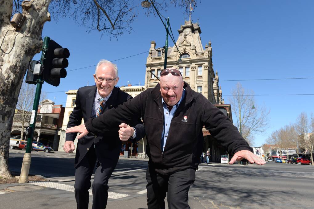ON YOUR MARKS: Bendigo Bank Fun Run course director Hunter Gill and City of Greater Bendigo representative Pat Connolly check out the new starting line for the event. Picture: JIM ALDERSEY