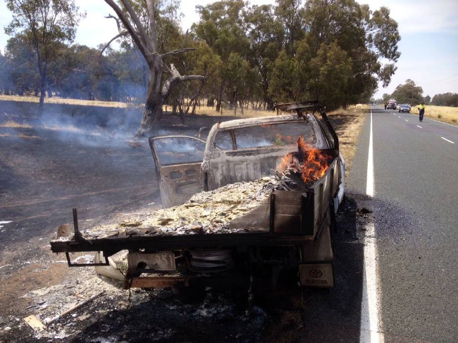 DESTROYED: The burnt out vehicle which sparked the 300-acre fire. Picture: BRENDAN McCARTHY