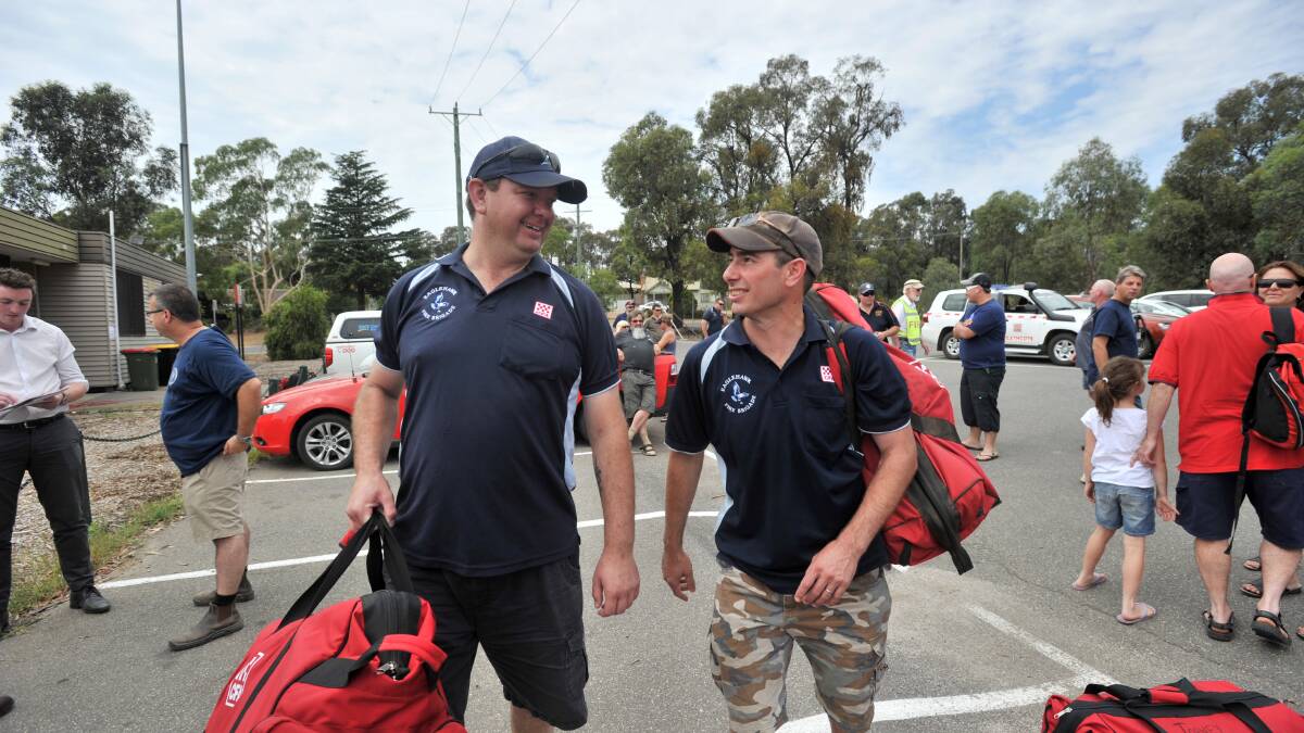 BAGS PACKED: Dan Miles and Ben Lee from Eaglehawk Fire Brigade. Picture: JODIE DONNELLAN 
