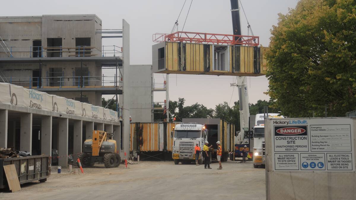 PUZZLE PIECE: Modules being put into place at a hotel on the new Bendigo Hospital project. Picture: JOSH FAGAN