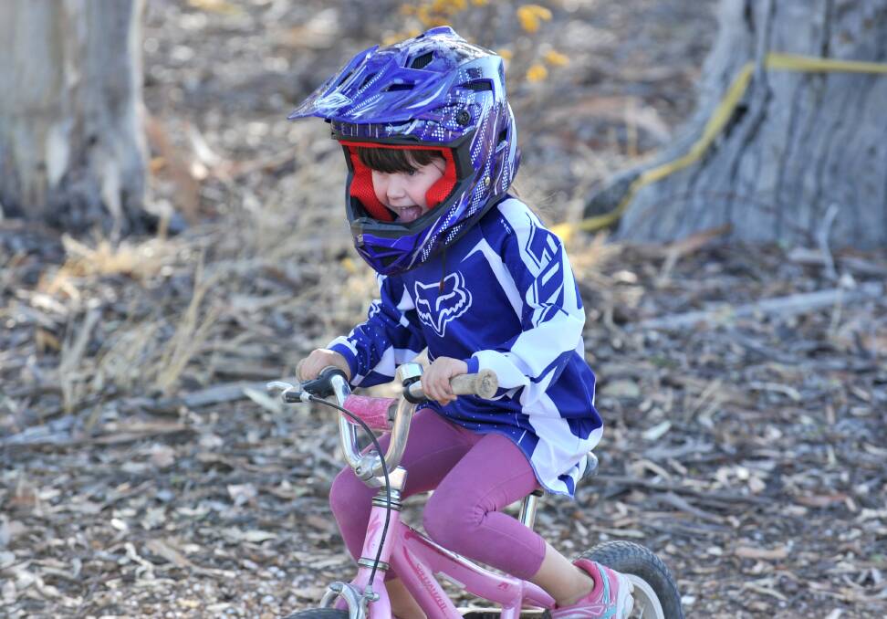 OFF AND RACING: Lila Kettle, 4, gets involved with the Bendigo Mountain Bike Club. 