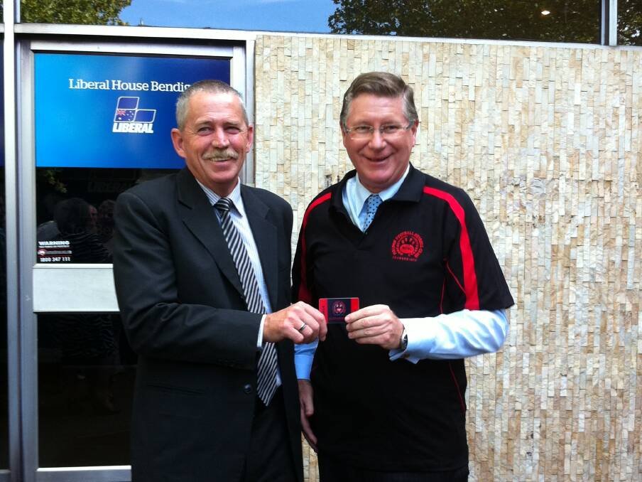 NUMBER ONE FAN: John Purcell and Denis Napthine. Picture: CONTRIBUTED