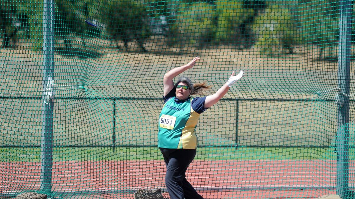 Sharon Barr competes in the hammer throw. Picture: JODIE DONNELLAN 
