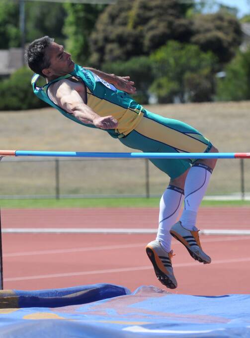 Luke De Biasi competes in the High jump 50-54 years. Picture: JODIE DONNELLAN 