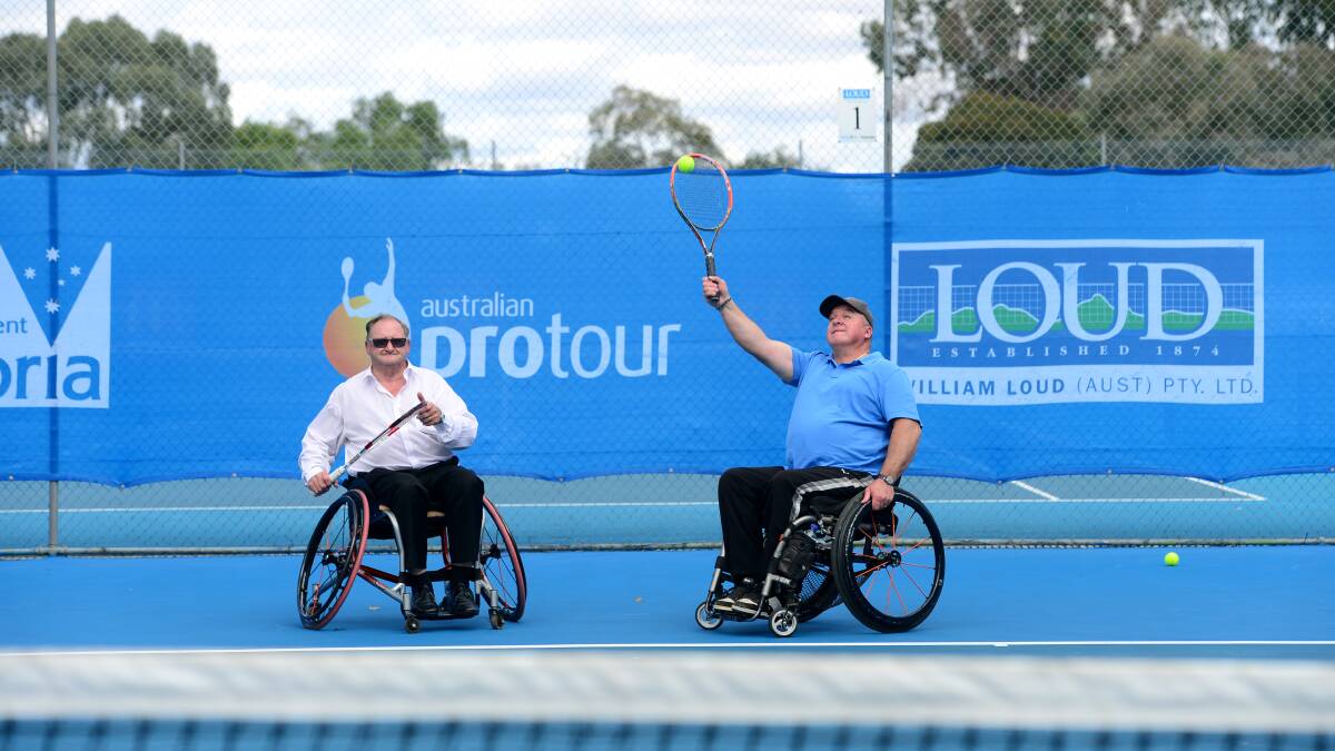Mayor Barry Lyons and Noel Clarke having a hit of Wheelchair tennis at the Bendigo Tennis Centre. Picture: JIM ALDERSEY