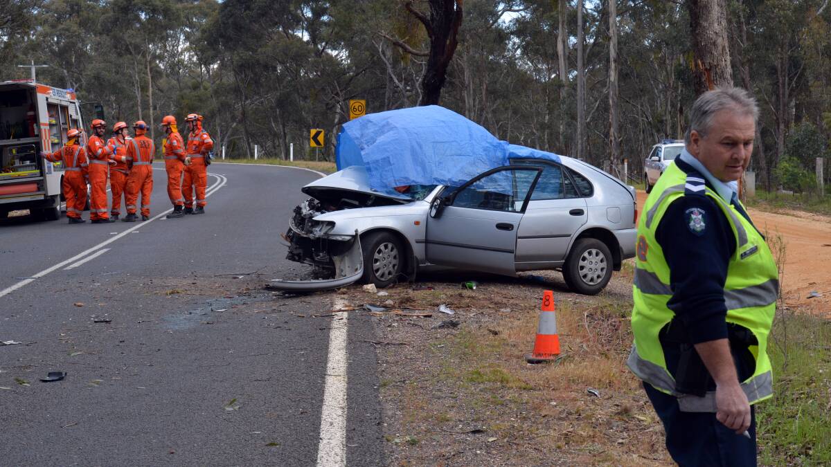 CRASH SCENE: A young male driver has died after his car veered off the Castlemaine-Maldon Road and hit a tree. Picture: BRENDAN McCARTHY