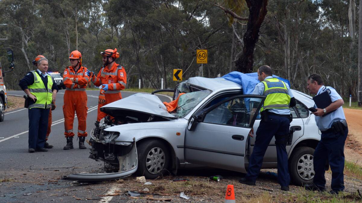 CRASH SCENE: A young male driver has died after his car veered off the Castlemaine-Maldon Road and hit a tree. Picture: BRENDAN McCARTHY
